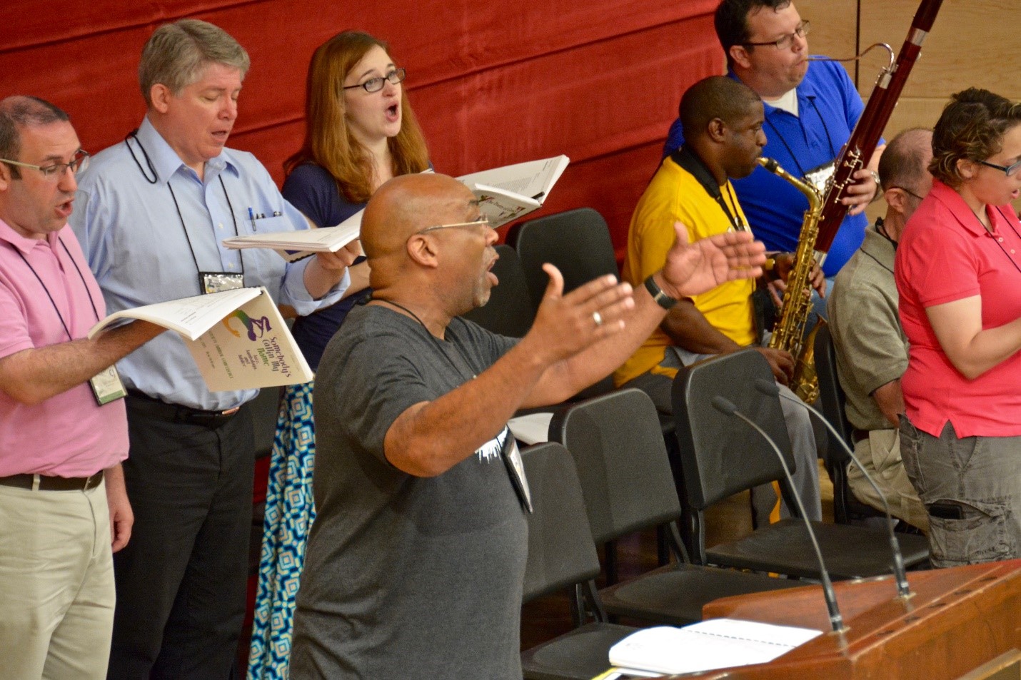 A local St. Louis Hymn Society member, Tom Baynham, leading us in morning worship in 2015.